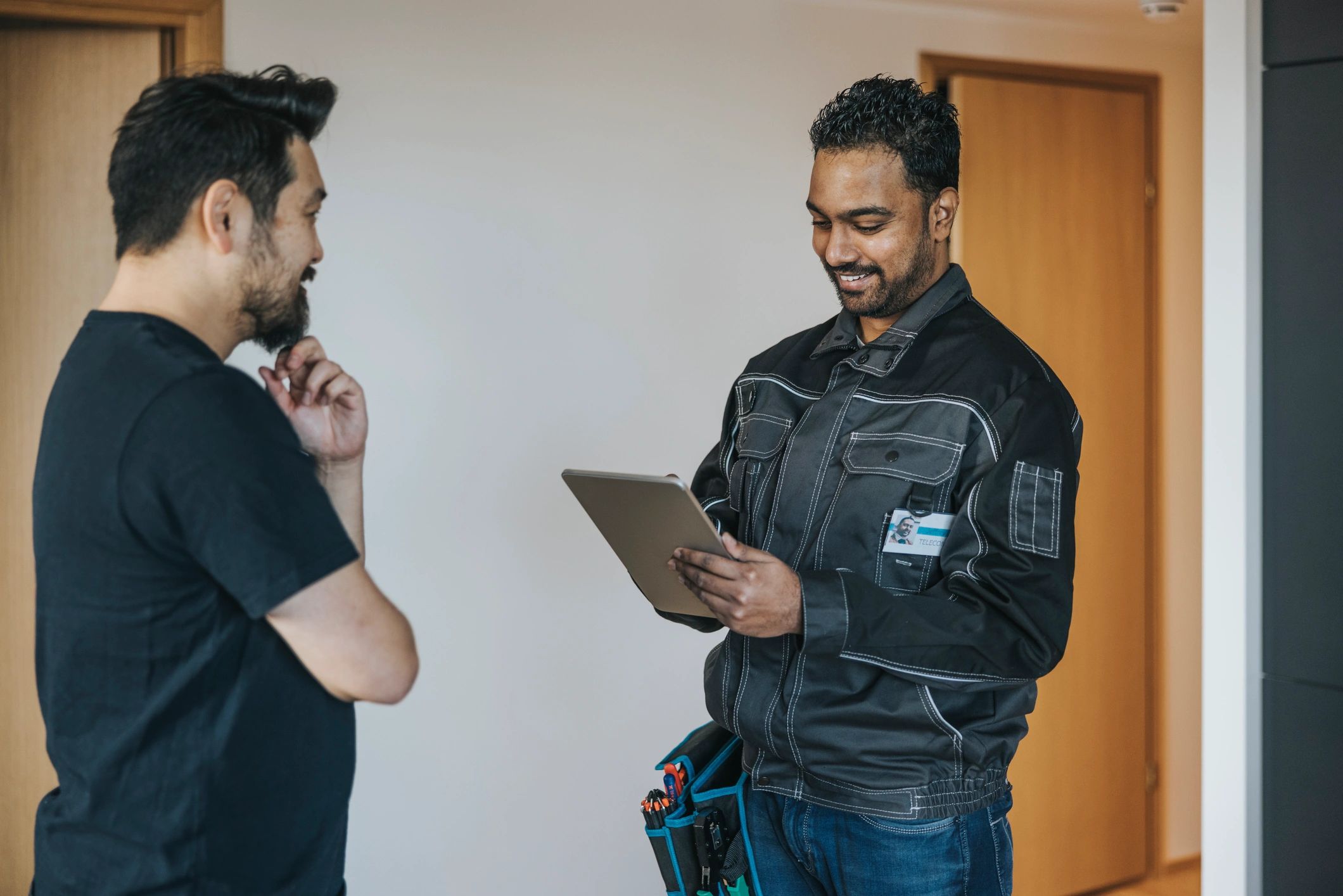 Homeowner discussing roof concerns with a professional